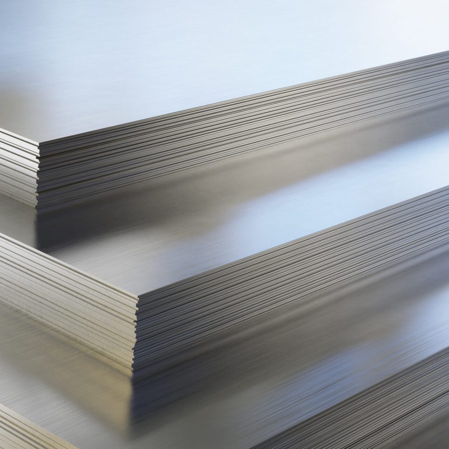 Steel or aluminum sheets in warehouse, rolled metal product.